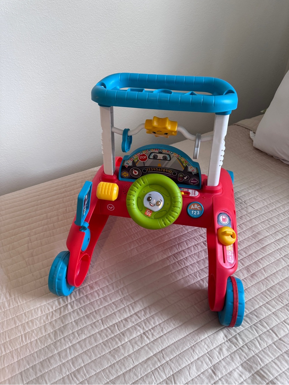 fisher price 2 sided steady speed walker
